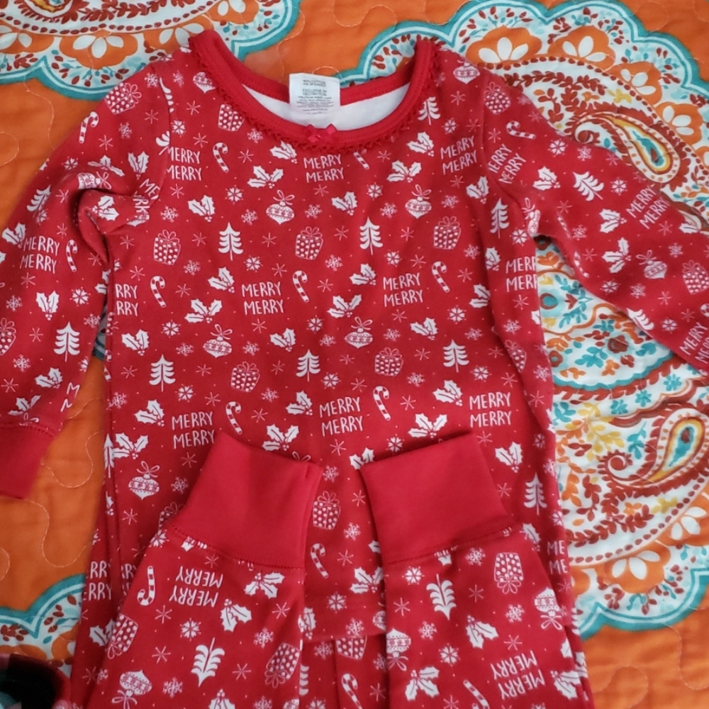 Two sets of Christmas pjs.